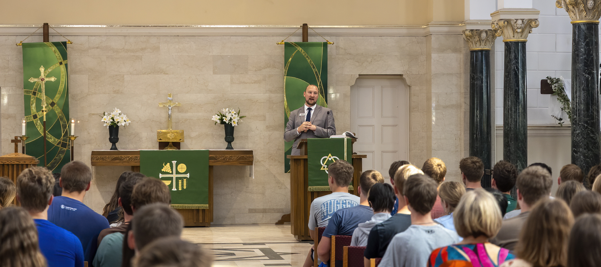 Pastor leading chapel service