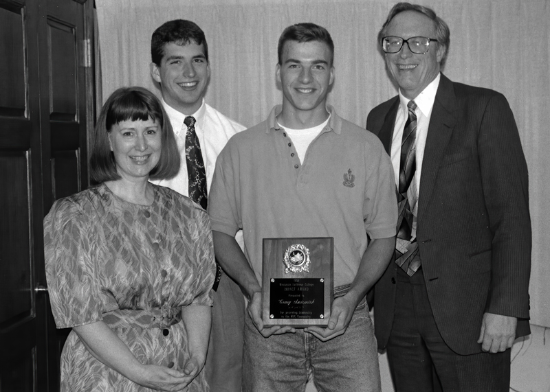 Craig receiving an award